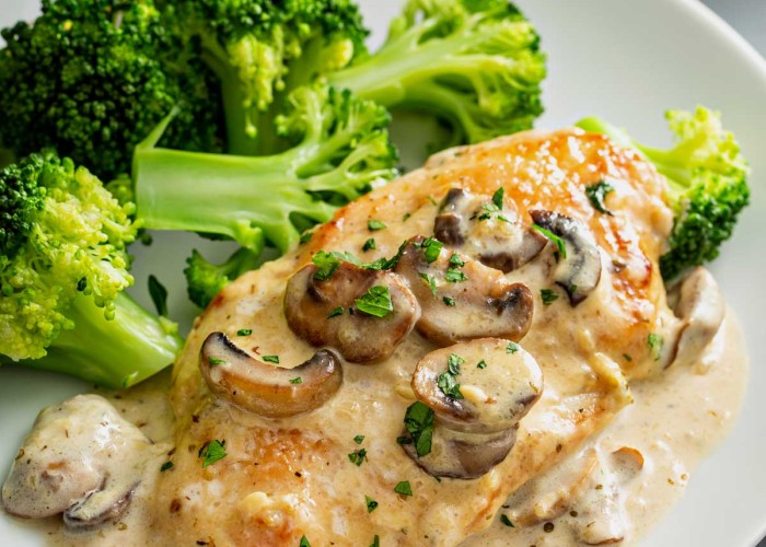 Chicken fillet with mushrooms in a creamy sauce